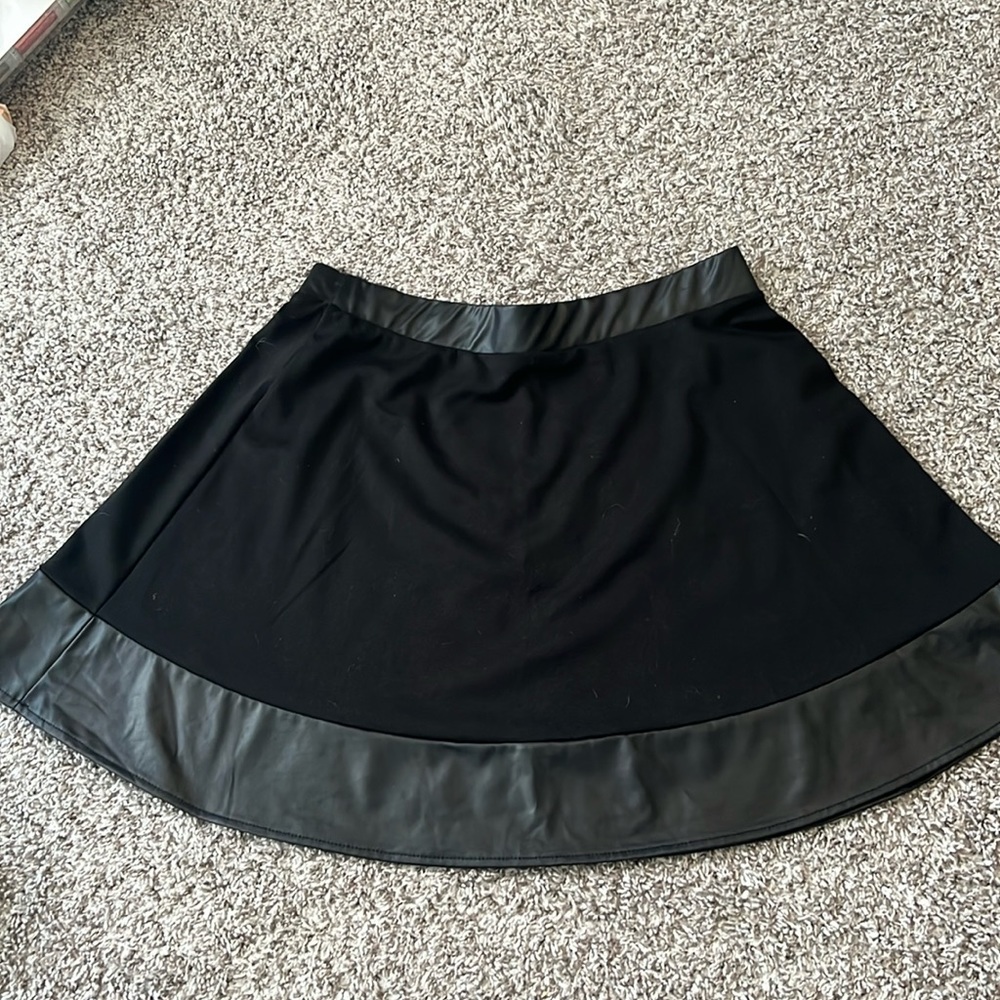 Black skirt with leather trim from Charlotte Russe. Size XL